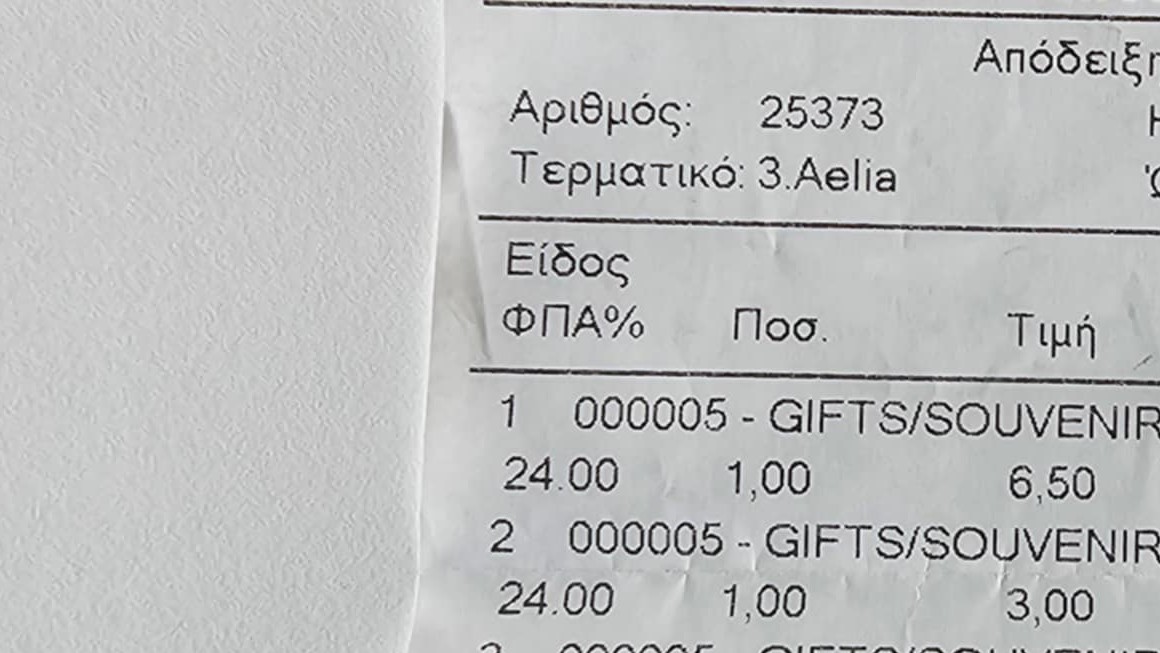 Účtenka po nákupe suvenírov.