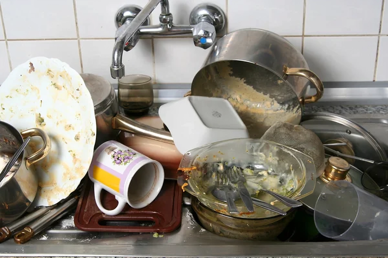 Dirty dishes in a sink