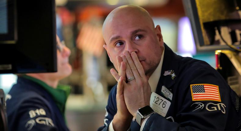 A trader works during the Fed rate announcement on the floor at the New York Stock Exchange (NYSE) in New York, U.S., March 20, 2019.
