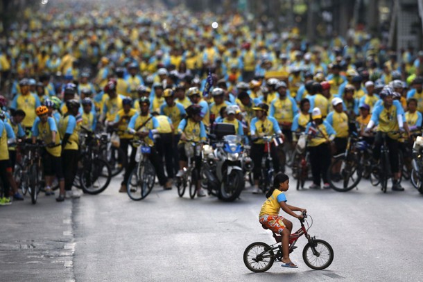 Cyclist take part in a Bike for Dad event in Bangkok, Thailand