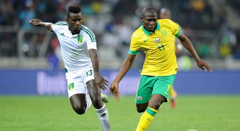 Aubrey Modiba (R) scored and created two goals as Mamelodi Sundowns defeated SuperSport United 3-1 on Wednesday to win a fourth consecutive South African  Premiership title. Creator: STRINGER