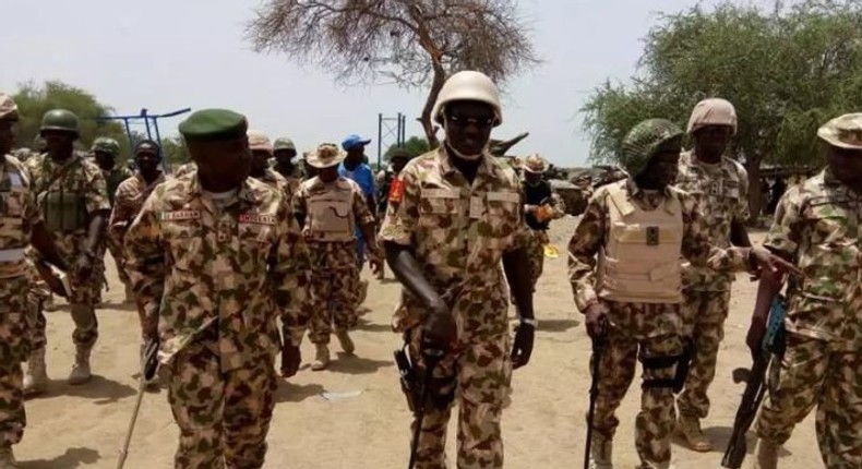 Army chief Lt. Gen. Tukur Buratai (M) in the midst of other senior officers