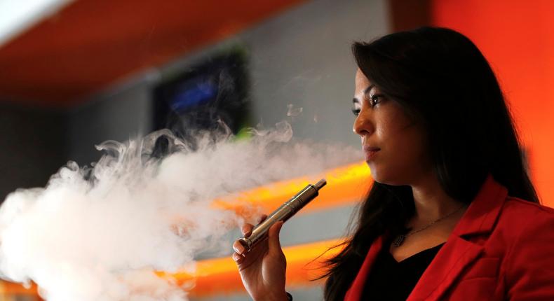 A woman uses a vaporizer at The Vapor Spot in Los Angeles, California.