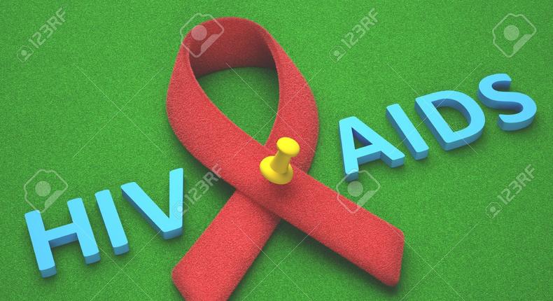 ___3924573___https:______static.pulse.com.gh___webservice___escenic___binary___3924573___2015___6___30___19___24254690-Red-ribbon-symbol-of-a-commitment-to-the-fight-against-HIV-AIDS--Stock-Photo