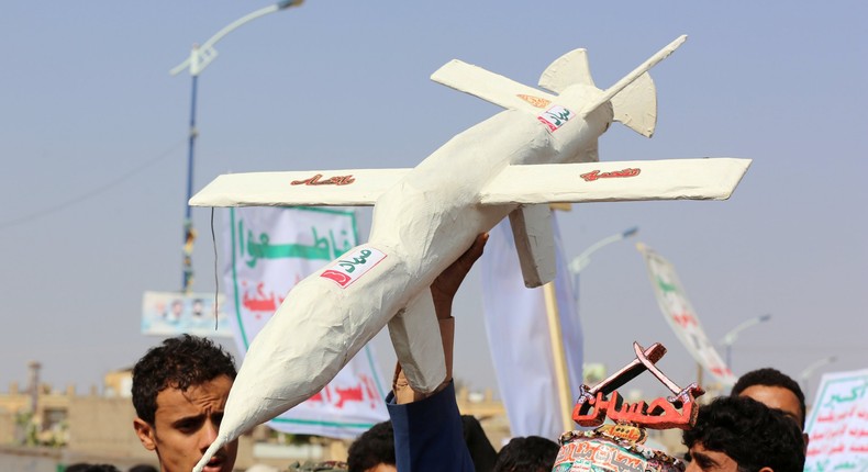 Followers of the Houthi movement carry a mock drone during a rally held to mark the Ashura in Saada, Yemen September 10, 2019.