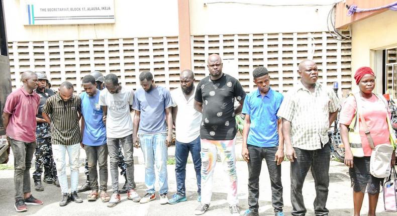 Lagos State Government officials during the arrest of fake enforcement officials in the Cele/Itire area of the state. [Twitter:@Mr_JAGs]