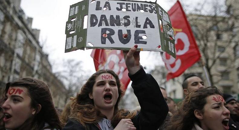 French unions lead labour law protest before meeting PM