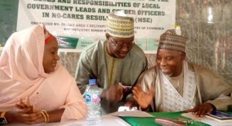 L-R: Coordinator, NG-CARES in Kebbi State, Hajiya Ruqayya Mohammed-Bawa, Special Adviser on Media to Gov. Atiku Bagudu of Kebbi State, Mallam Yahaya Sarki and Commissioner for Commerce and Industries, Alhaji Ibrahim Garba-Geza discussing during a sensitisation workshop for NG-CARES Field Officers in Birnin Kebbi on Thursday. (NAN)