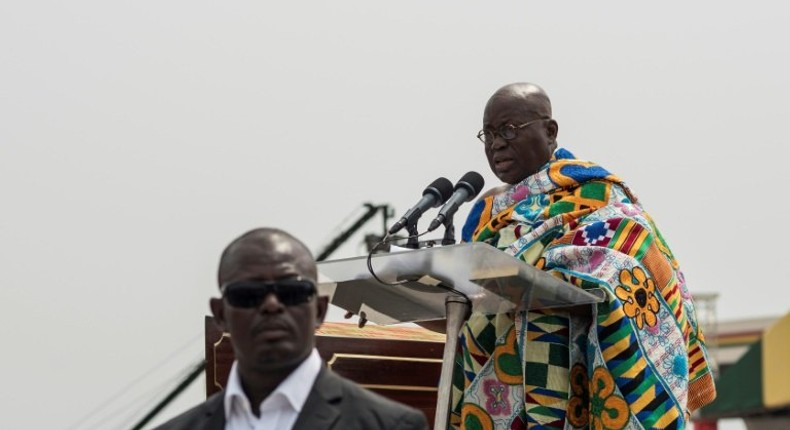 The winner of Ghana's presidential election, Nana Akufo-Addo, takes the oath of office during the swearing-in ceremony at Independence Square in Accra, on January 7, 2017