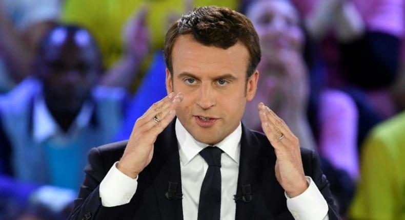 French presidential election candidate for the En Marche ! movement, Emmanuel Macron delivers a speech during a campaign rally on May 1, 2017 in Paris