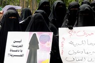 Egyptian women wearing niqab protest