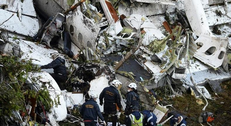 Rescue teams work in the recovery of the bodies of victims of the LAMIA airlines charter that crashed in the mountains of Cerro Gordo, Colombia, on November 29, 2016 carrying members of the Brazilian football team Chapecoense Real
