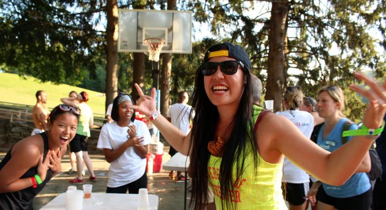 An attendee celebrates her Flip Cup semifinal win at Club Getaway.