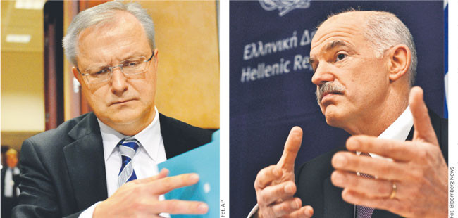 Komisarz ds. finansowych UE Olli Rehn (po lewej) leci w poniedziałek do Aten, aby domagać się od premiera Grecji Jeorjosa Papandreu dodatkowego podwyższenia podatków i ograniczenia kolejnych programów socjalnych