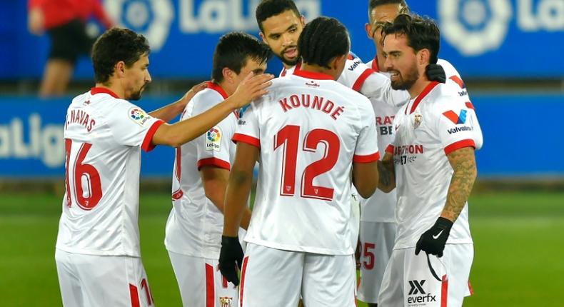 Suso (R) scored a terrific goal to earn Sevilla victory at Alaves