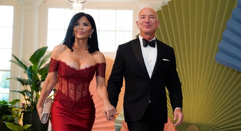 Jeff Bezos' fiance, Lauren Sanchez, wore a daring, fiery-red sheer corset dress by Rasario.