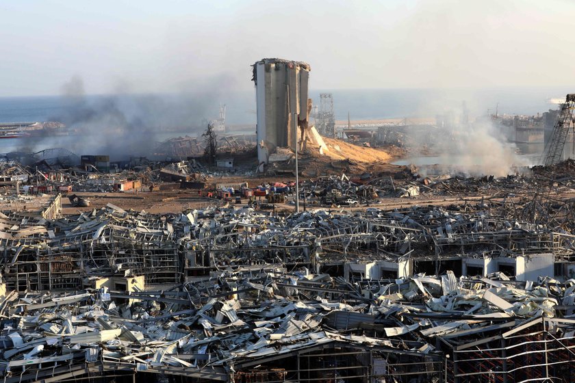 Damaged vehicle and buildings are pictured near the site of Tuesday's blast in Beirut's port area