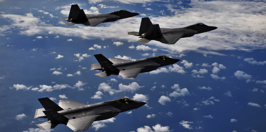 F-35s and F-22s conducting an integrated test flight.
