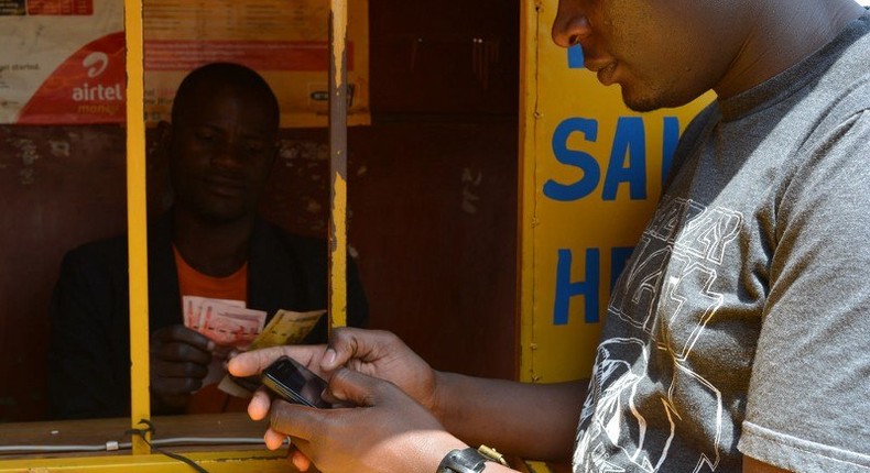 A customer at one of the mobile money centre