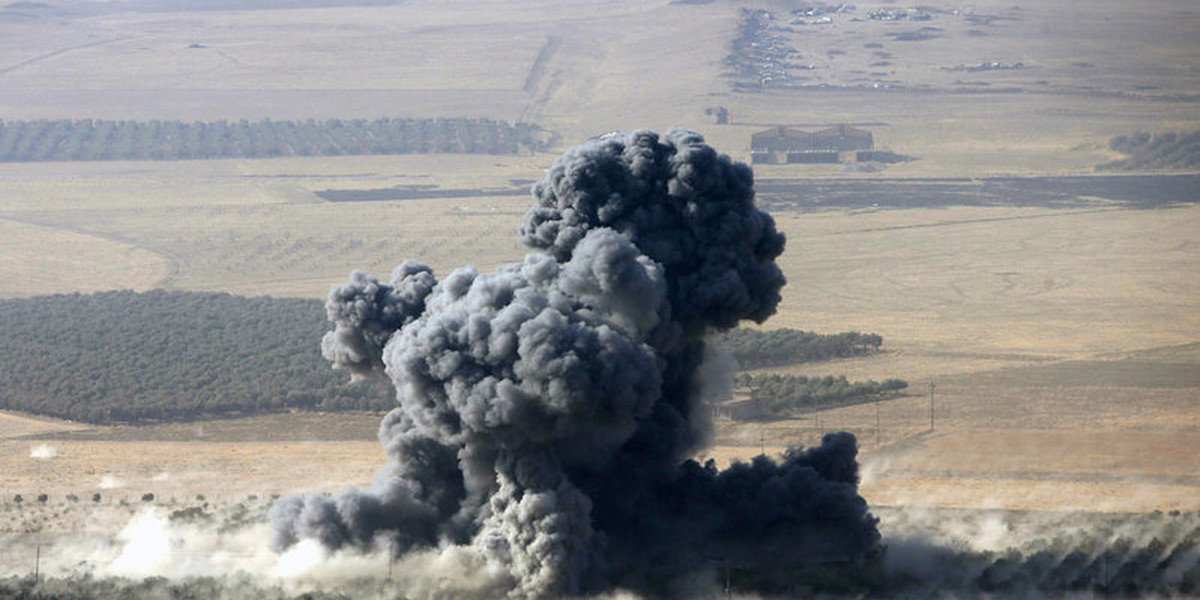 Smoke rises at Islamic State militants' positions in the town of Naweran, near Mosul in northern Iraq.
