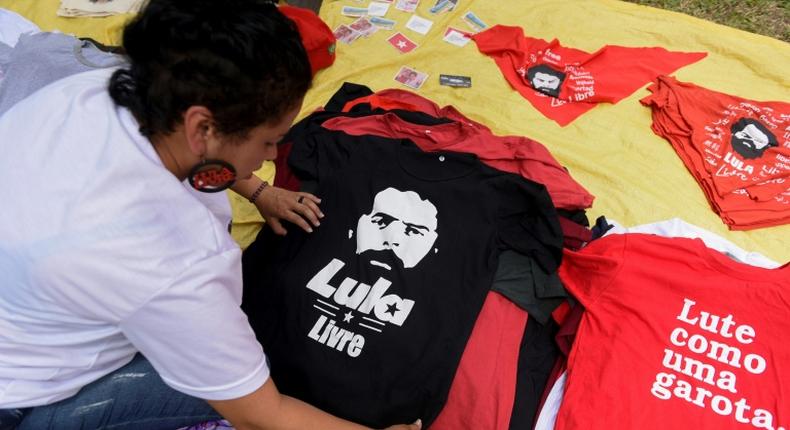 Street vendors offers jerseys urging the release from jail of former Brazilian President Luiz Inacio Lula da Silva; his girlfriend Rosangela da Silva tweeted on November 8, 2019 'I'm coming for you, wait for me'