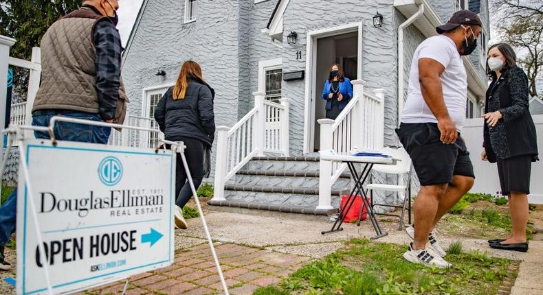 Real estate agents work an open house in West Hempstead, New York.Raychel Brightman/Newsday RM via Getty Images