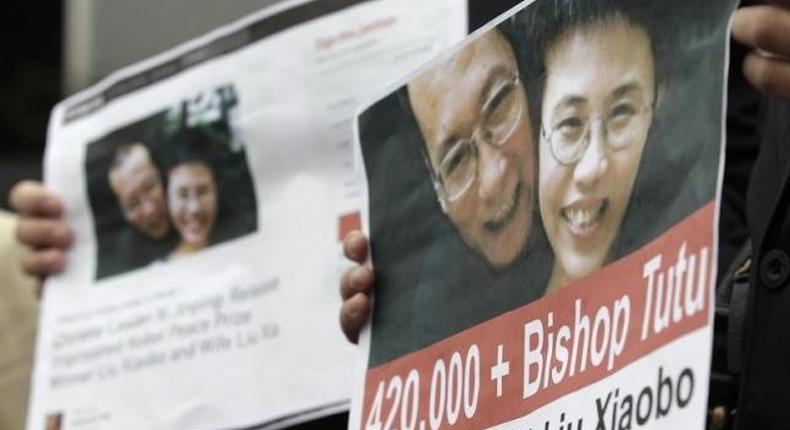 Nobel winners urge British PM to press China's Xi on dissidents