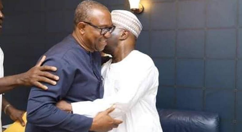 Peter Obi (left) hugs Atiku Abubakar (right) before a meeting in Abuja.