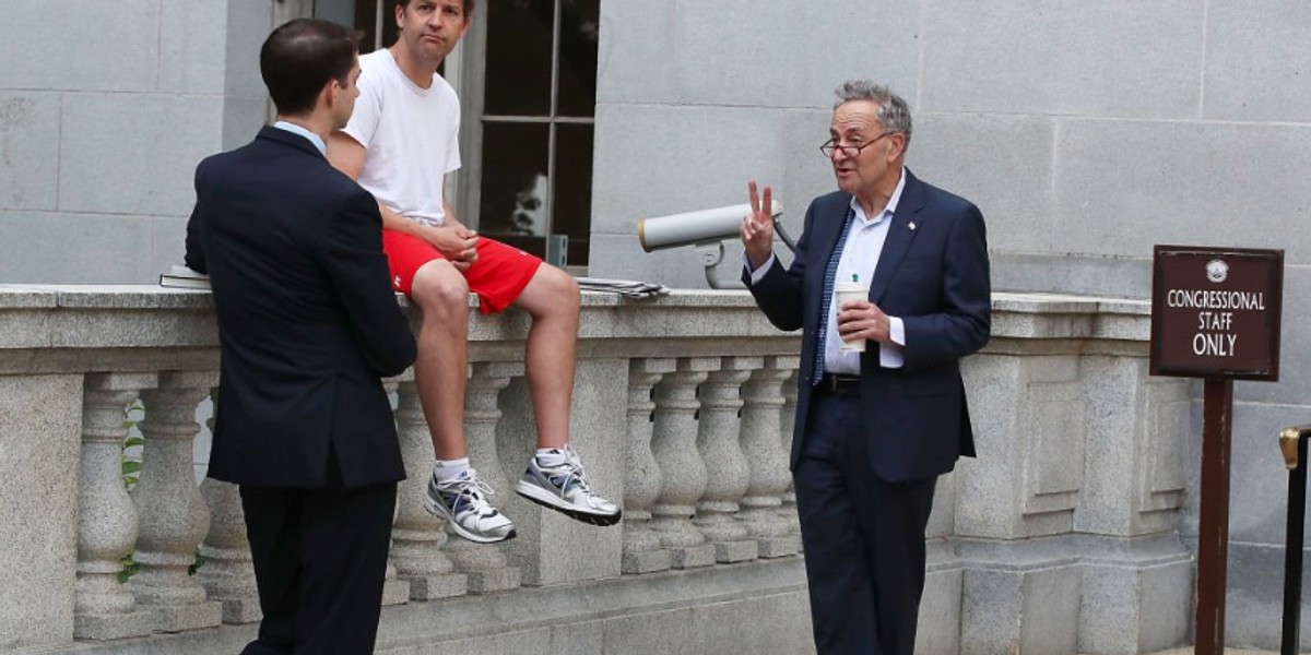 Top Republican senator jokes that viral photo of him looks like he's smoking weed outside a wedding