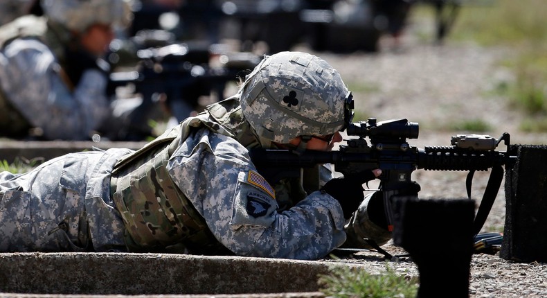 Female soldiers from the US Army's 1st Brigade Combat Team, 101st Airborne Division training on a firing range in Fort Campbell, Kentucky on September 18, 2012.
