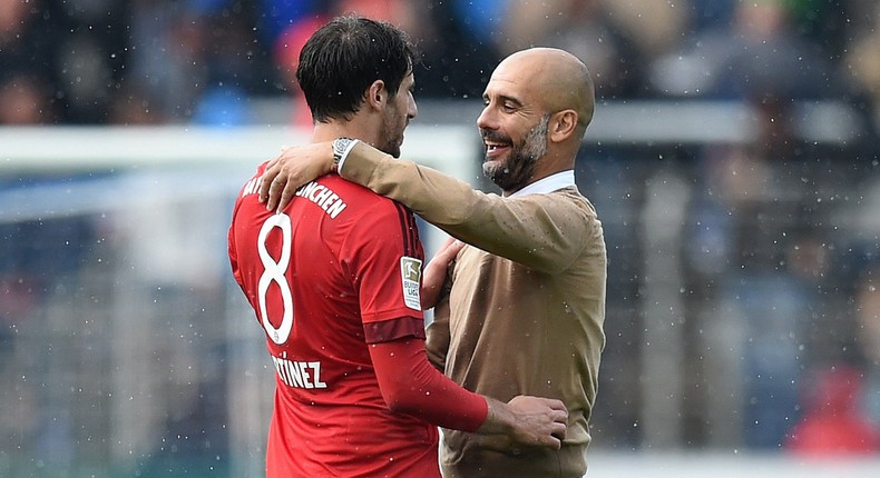 ___4499368___https:______static.pulse.com.gh___webservice___escenic___binary___4499368___2015___12___27___15___javi-martinez-pep-guardiola-cropped_1pjg5mn8b59h01hydap4er443b_2