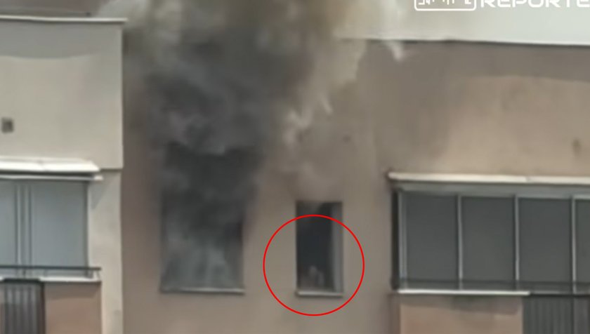 Horror in Warsaw. She stood in the window and waited for the rescue. There was a fire around