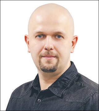 Tomasz Zieliński, autor bloga InformatykZakladowy.pl i projektu Monitor SLPS. Programista z 20-letnim doświadczeniem