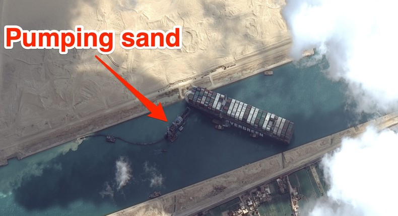 The Mashhour dredger removing sand from around the stuck Ever Given ship in the Suez Canal.
