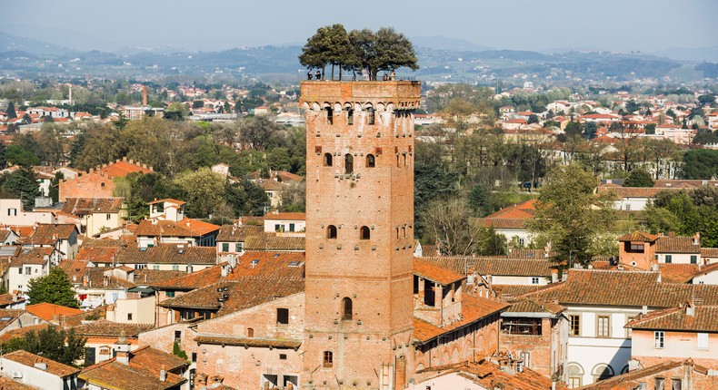 Located in Lucca, Italy, the Torre Guinigi is a 14th-century tower topped with an array of holm oak trees.