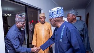 Mr Ade Omole (Left), Director of Diaspora Directorate of the defunct APC Presidential Campaign Council cPCC) in a handshake with President Bola Tinubu