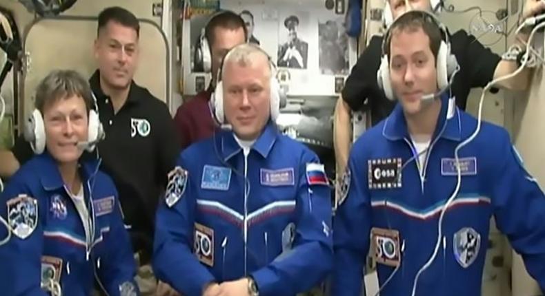 NASA astronaut Peggy Whitson (L), Russian cosmonaut Oleg Novitskiy (C) and Thomas Pesquet (R) of the ESA after docking at the ISS