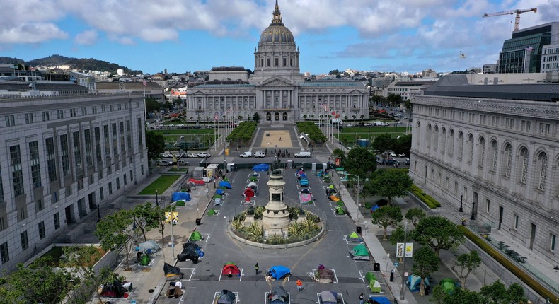 An aerial view of San Francisco's first temporary sanctioned tent encampment for the homeless on May 18, 2020 in San Francisco, California. After public outrage mounted over a surge of homeless people and tents filling the streets of San Francisco during the coronavirus (COVID-19) pandemic, the City opened its first temporary sanctioned tent encampment.
