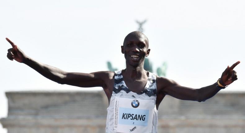 Kipsang, seen here at the Berlin Marathon in 2018, spent the night in jail for breaking Kenya's curfew