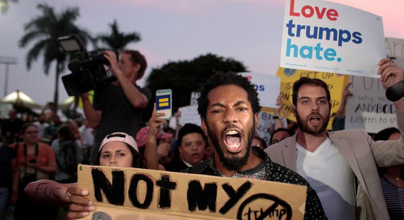 People protesting President-elect Donald Trump in Miami, Florida.