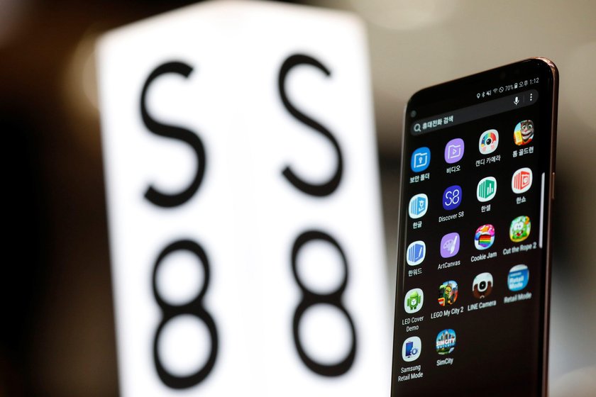 A Samsung Electronics's Galaxy S8 is displayed at its office building in Seoul