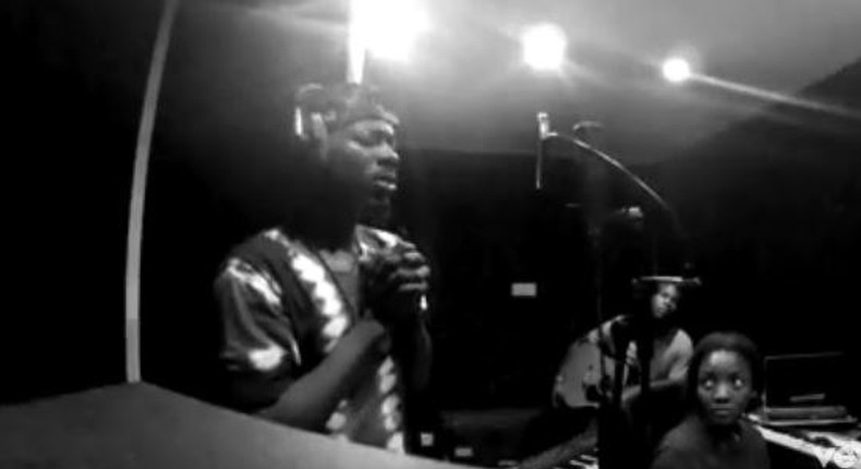 Adekunle Gold and Simi in studio.