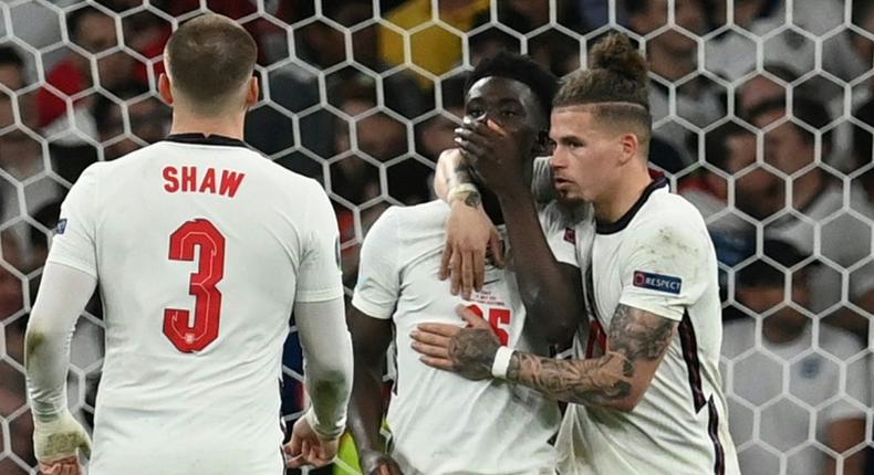 England's Bukayo Saka (centre) was racially abused online after missing the decisive penalty in the Euro 2020 final against Italy Creator: Paul ELLIS