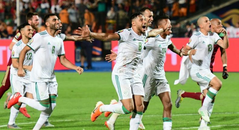 Algeria players celebrate their victory over Senegal in the Africa Cup of Nations final