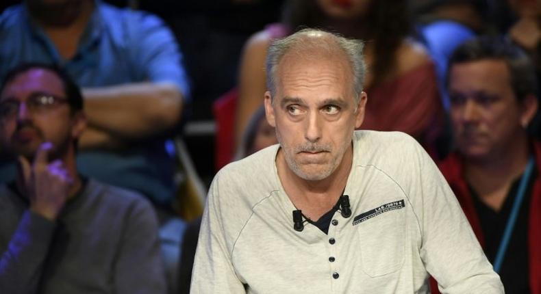 French presidential election candidate for the far-left New Anticapitalist Party (NPA) Philippe Poutou looks on during a debate between the eleven candidates for the French presidential election, on April 4, 2017