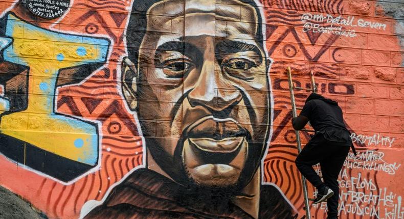 A mural of George Floyd, whose US police killing has sparked worldwide protests against police brutality, in Nairobi's Kibera slum