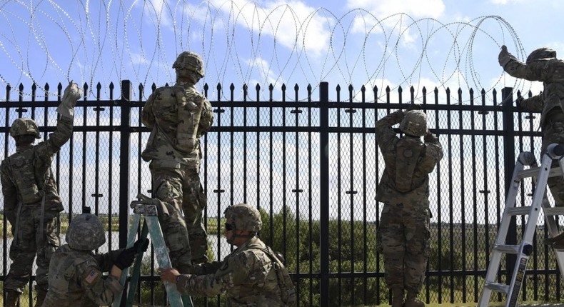 Soldiers from various Engineering Units install concertina wire Nov. 5, 2018, on the Anzalduas International Bridge, Texas. U.S Northern Command is providing military support to the Department of Homeland Security and U.S. Customs and Border Protection to secure the southern border of the United States.