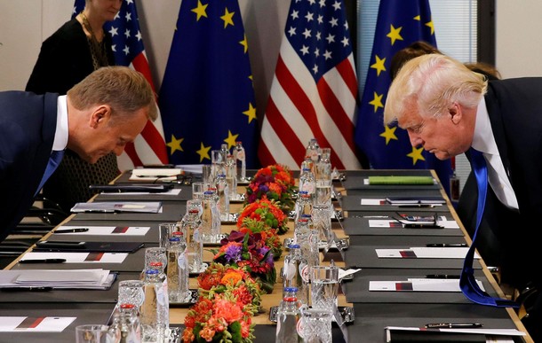 U.S. President Trump and the President of the European Council Tusk take their seats before their me