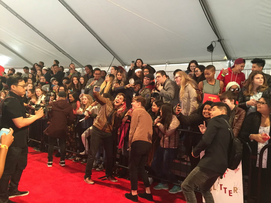 To enter the event, you had to walk down a red carpet flanked by a crowd of screaming teens.