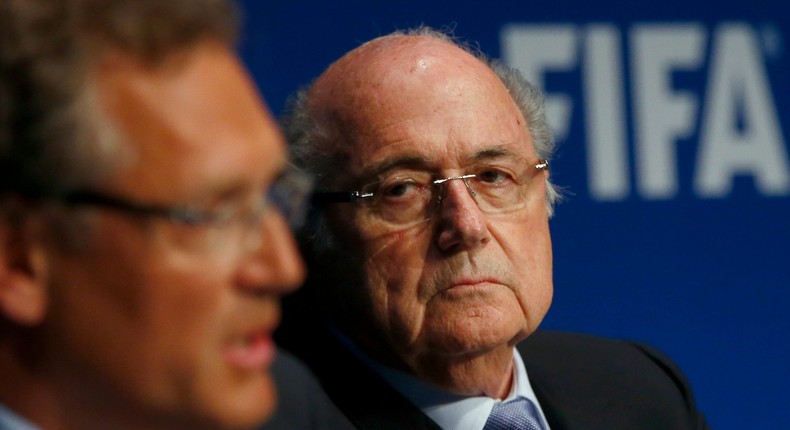 FIFA President Sepp Blatter listens to secretary general Jerome Valcke (L) during a news conference after a meeting of the FIFA executive committee in Zurich March 20, 2015.
